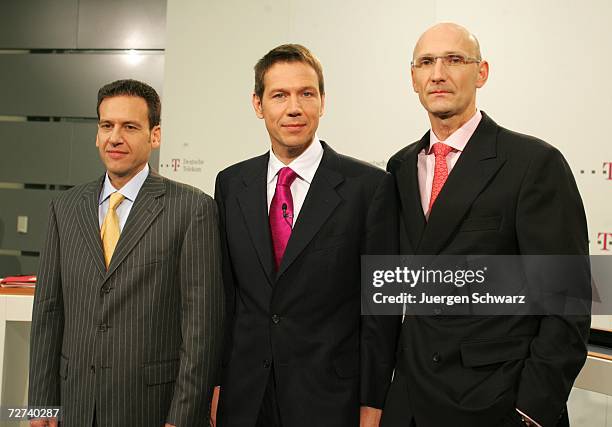 Deutsche Telekom CEO Rene Obermann poses with new Board of Management members T-Mobile CEO Hamid Akhavan and Timotheus Hoettges .at a news conference...