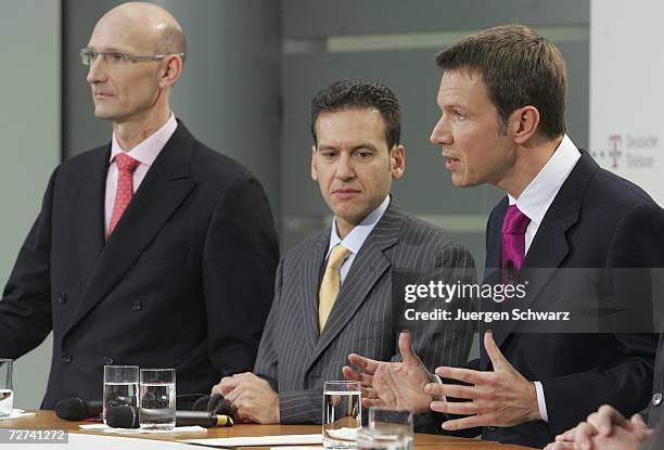 Deutsche Telekom CEO Rene Obermann speaks to his new Board of Management members Timotheus Hoettges and T-Mobile CEO Hamid Akhavanat a news...