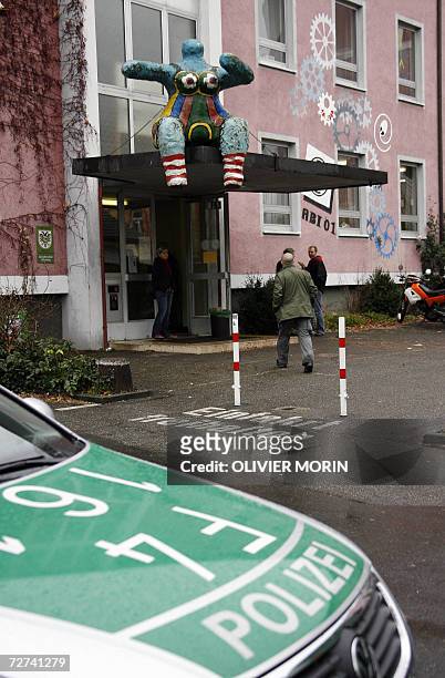 Police forces patrol the high school of Gewerbesschule, 06 December 2006, in Offenburg. Schools in the region of Bade-Wurtemberg were on high alert...