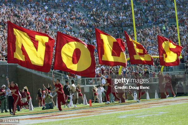 The cheer squad of the Florida State Seminoles carry banners before the game against the Florida Gators at Doak Campbell Stadium November 25, 2006 in...