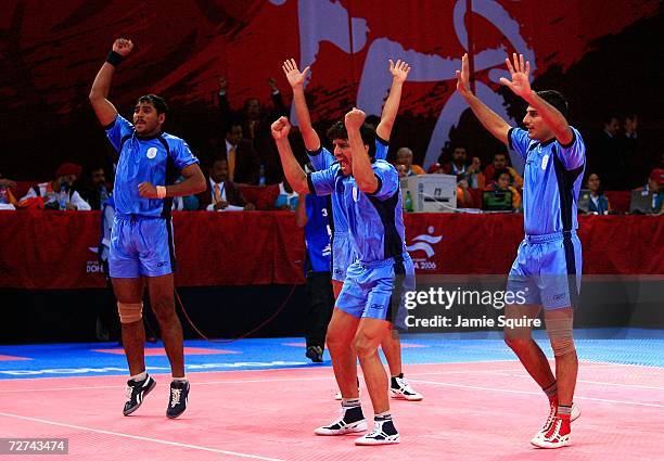 The Indian team celebrate winning the gold medal by defeating Pakistan in the Men's Kabaddi Gold Medal match at the 15th Asian Games Doha 2006 at...