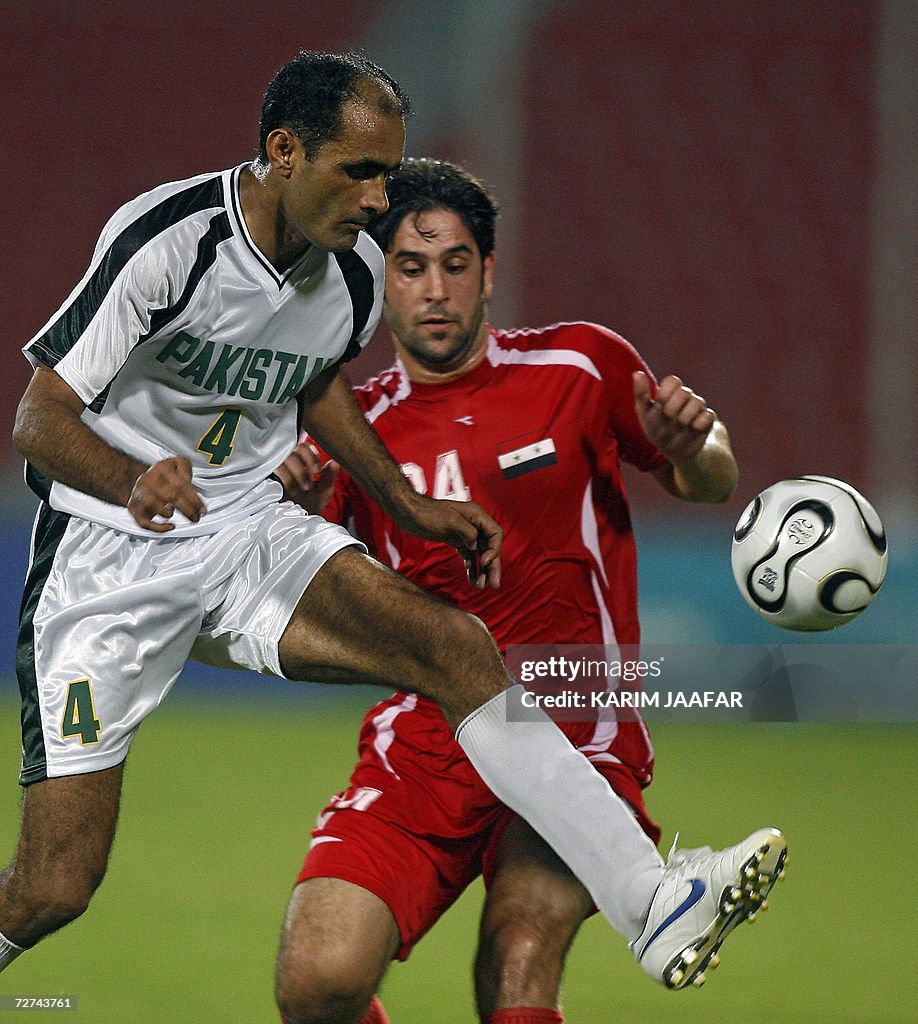 Said Ravanfar Football Syrian national team football player Rafe Raja vies with Tanveer ...