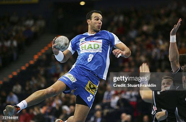 Bruno Souza of Hamburg throws a goal during the Bundesliga game between HSV Handball and TUS N-Luebbecke at the Color Line Arena on December 6, 2006...