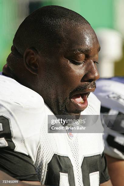 Defensive tackle Warren Sapp of the Oakland Raiders sits on the bench against the Kansas City Chiefs on November 19, 2006 at Arrowhead Stadium in...