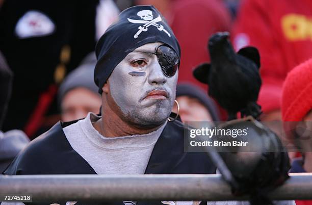 An Oakland Raiders fan watches the game against the Kansas City Chiefs on November 19, 2006 at Arrowhead Stadium in Kansas City, Missouri. The Chiefs...