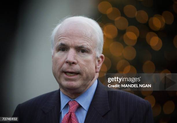 Washington, UNITED STATES: Senator John McCain, R-AZ, speaks to the press after attending a bicameral meeting on the Iraq Study Group report held by...