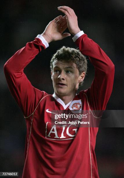 Ole Gunnar Solskjaer of Manchester United applauds the fans after the UEFA Champions League match between Manchester United and Benfica at Old...