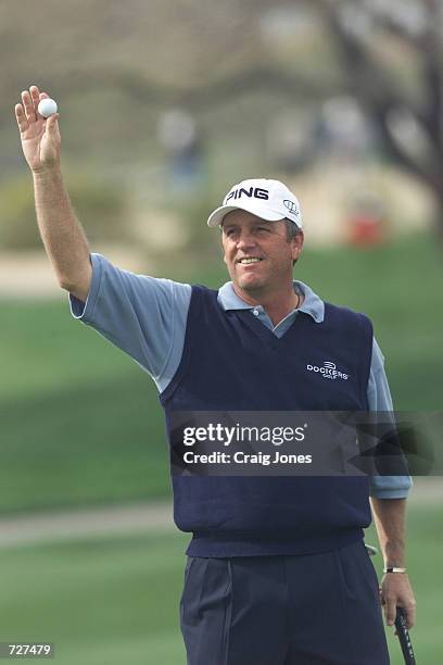 Mark Calcavecchia celebrates his round of 60 during the second round of the Phoenix Open at the TPC of Scottsdale in Scottsdale, Arizona. DIGITAL...