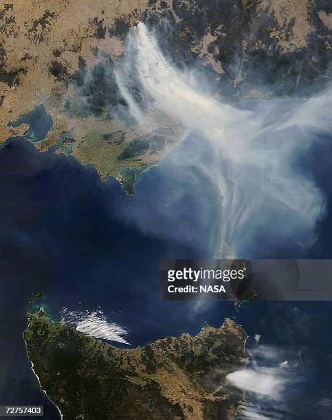 This satellite image from NASA taken on December 5, 2006 shows smoke from bush fires in southeastern Australia. At left is Melbourne and Port Phillip...