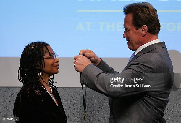 California Gov. Arnold Schwarzenegger recognizes Pulitzer Prize-winning author Alice Walker as she is inducted into the California Hall of Fame...