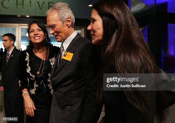 Actor Clint Eastwood, his wife Dina Eastwood and Patti Davis, daughter of former U.S. President Ronald Reagan, arrive at the induction ceremony for...