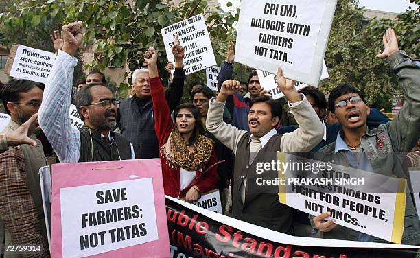 Activists of the National Alliance of People's Movement and various organisations shout slogans against the Communist Party of India during a protest...