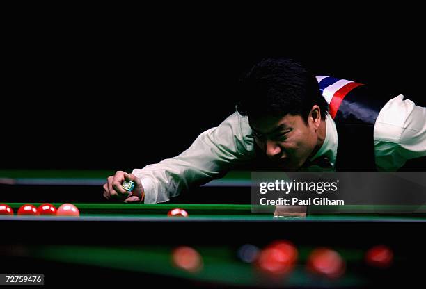 Fu Ka Chun Marco of Hong Kong, China lines up a shoot in his match against Do Hoang Quan of Vietnam during the Men's Snooker Singles last 16 match at...