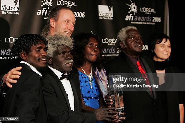 The cast of Ten Canoes including Jamie Gulpilil , Rolf de Heer Frances Djulibing and Julie Ryan pose with the L'Oreal Paris AFI Award for Best Film...