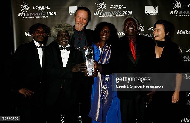 The cast of Ten Canoes including Jamie Gulpilil , Rolf de Heer Frances Djulibing and Julie Ryan pose with the L'Oreal Paris AFI Award for Best Film...