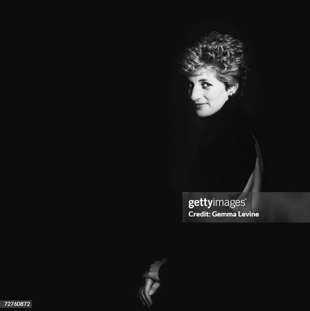 Princess Diana, Princess of Wales posing against a dark background, circa 1995.