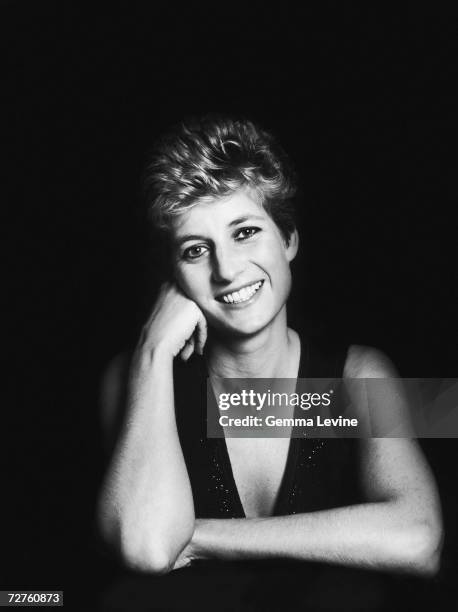 Princess Diana, Princess of Wales posing against a dark background, circa 1995.