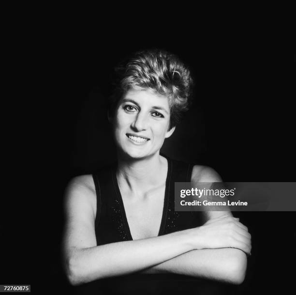 Princess Diana, Princess of Wales posing against a dark background, circa 1995.