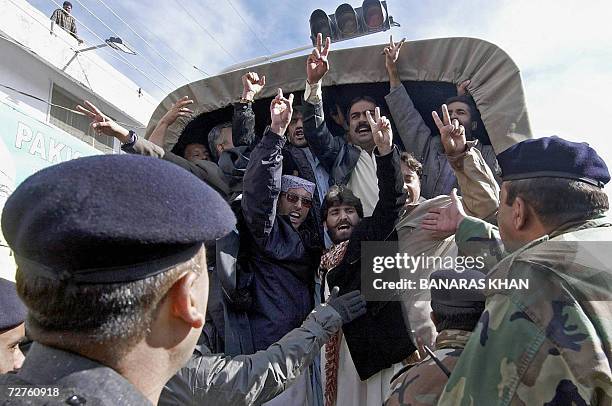 Pakistani policemen arrest protesters who demonstrated against the visit of President Pervez Musharraf in Quetta, 07 December 2006. This was the...