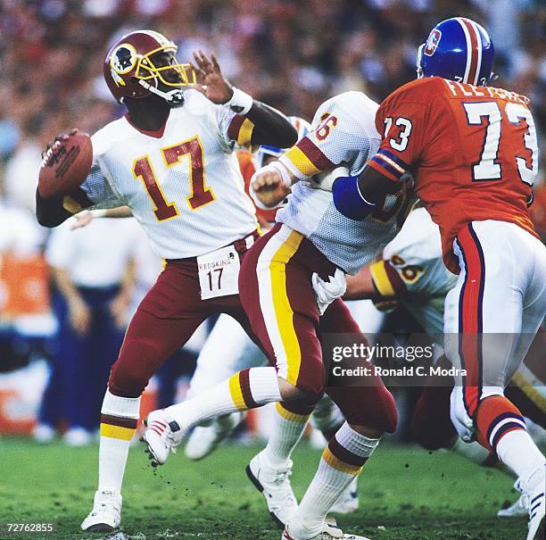 Quarterback Doug Williams of the Washington Redskins passing against the Denver Broncos in Super Bowl XXII in Jack Murphy Satdium on January 31, l988...