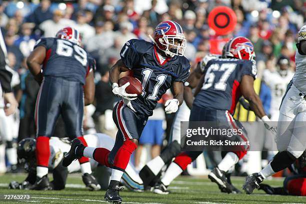 Wide receiver Roscoe Parrish of the Buffalo Bills carries the ball against the Jacksonville Jaguars on November 26, 2006 at Ralph Wilson Stadium in...