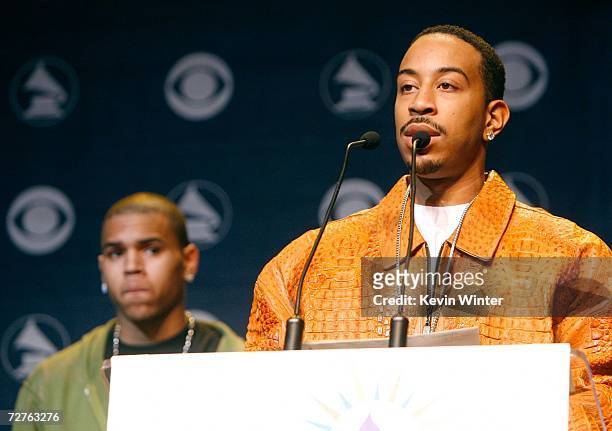 Singer Chris ?Ludacris? Bridges announces the "Best Pop Vocal Album" and ?Best R&B Album? nominees as singer Chris Brown looks on during the 49th...