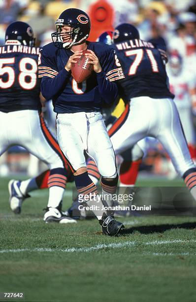 Quarterback Cade McNown of the Chicago Bears pulls back to pass during the game against the New York Giants at Soldier Field in Chicago, Illinois....