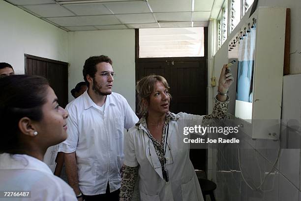 Dr. Nancy Magarita Gonzalez Rodriguez goes over an x-ray with her students at the Latin American School of Medical Sciences December 4, 2006 in...