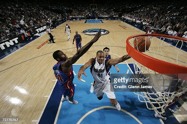 Devean George of the Dallas Mavericks shoots a layup against the Detroit Pistons December 7, 2006 at the American Airlines Center in Dallas, Texas....