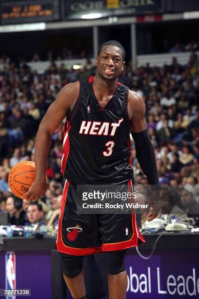 Dec 25, 2006; Miami, FL, USA; The Heat's DWYANE WADE glides in for