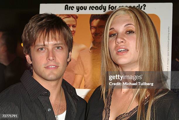 Actor Brett Chukerman and actress Rebecca Kochan arrive at the world premiere of the new movie "Eating Out 2", held at the Sunset 5 Theater on...