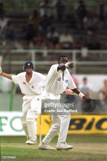 West Indian fast bowler Curtly Ambrose traps England batsman Mike Atherton LBW off his first ball on the 4th day of the 3rd Test at Queen's Park...