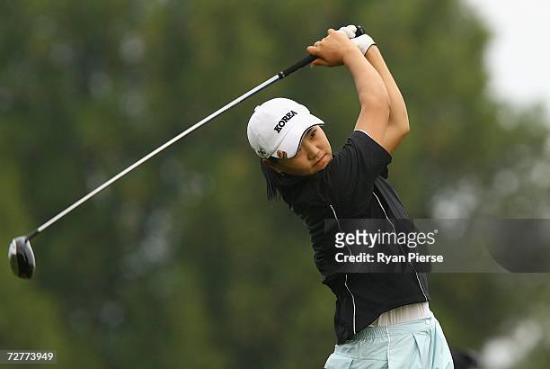 Ryu So Yeon of Korea hits her driver during round one of Women's Golf during day eight of the 15th Asian Games Doha 2006 at Doha Golf Club on...