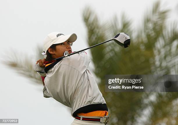 Tseng Ya Ni of Chinese Taipei hits her driver during round one of Women's Golf during day eight of the 15th Asian Games Doha 2006 at Doha Golf Club...