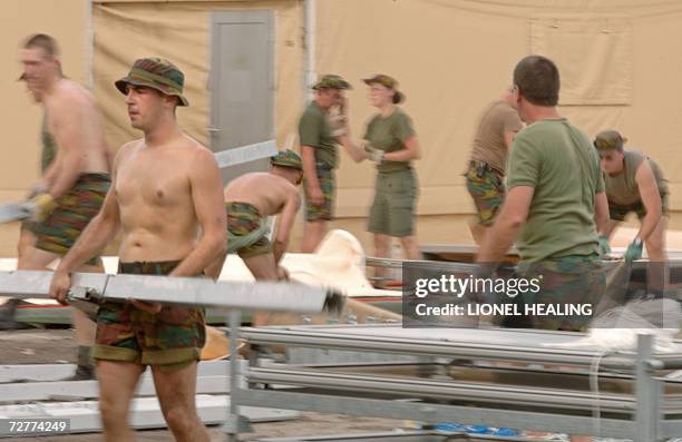 Kinshasa, Democratic Republic of the Congo: Belgian troops from EUFOR pack away tents, 08 December 2006, at N'Dolo Airbase, in Kinshasa. The mandate...