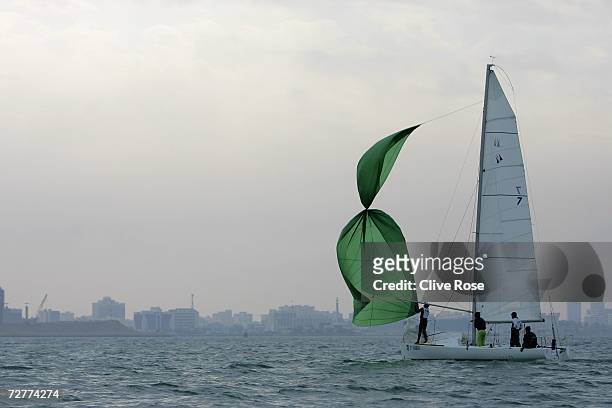 Competitor makes a mess of hoisting their spinaker during the Match racing at the Sailing at the Doha Sailing Club during the 15th Asian Games Doha...