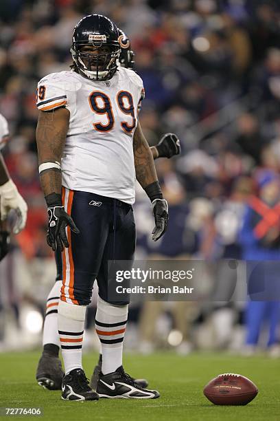 Defensive tackle Tank Johnson of the Chicago Bears prepares for a play against the New England Patriots on November 26, 2006 at Gillette Stadium in...