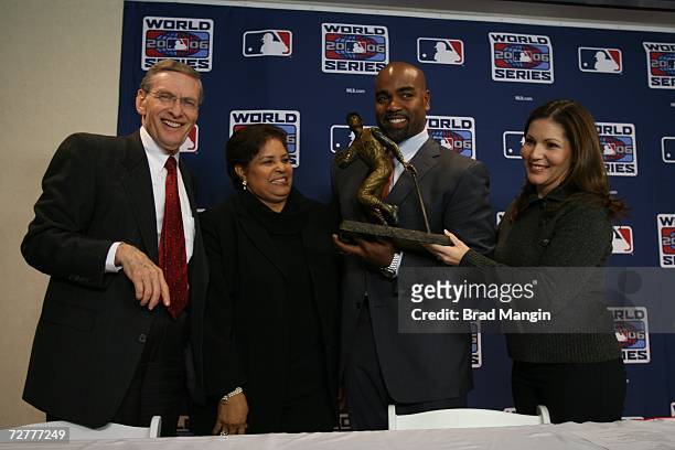 Carlos Delgado of the New York Mets receives the Roberto Clemente Award from Commissioner Bud Selig prior to Game Three of the 2006 World Series on...