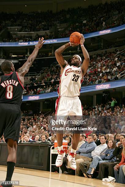 LeBron James of the Cleveland Cavaliers shoots over Martell Webster of the Portland Trail Blazers during the game on November 15, 2006 at The Quicken...
