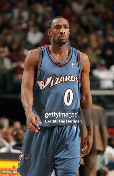 Gilbert Arenas of the Washington Wizards walks on the court during the NBA game against the Dallas Mavericks on November 21, 2006 at the American...