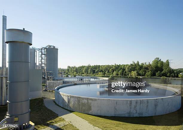 paper plant, water treatment area - sewage treatment plant stock pictures, royalty-free photos & images