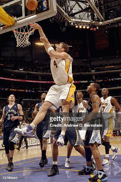 Luke Walton of the Los Angeles Lakers jumps high to attack the basket against the Memphis Grizzlies at Staples Center on November 12, 2006 in Los...