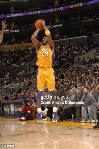 Kobe Bryant of the Los Angeles Lakers shoots a jump shot during a game against the Milwaukee Bucks at Staples Center on November 28, 2006 in Los...