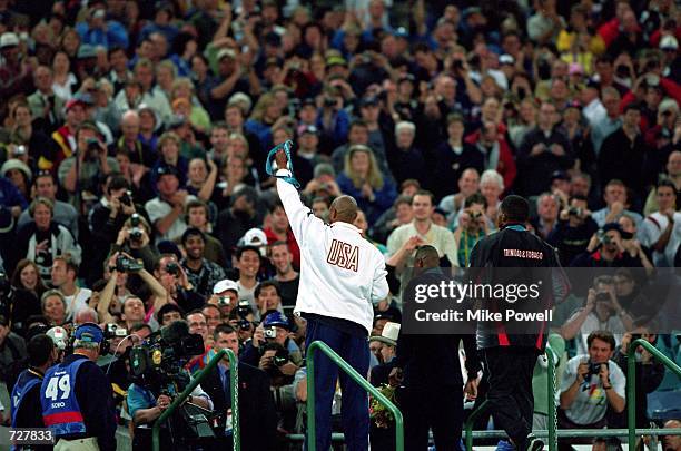 Obadle Maurice Greene of the USA Gold, Obadele Thompson of Barbados Bronze ...