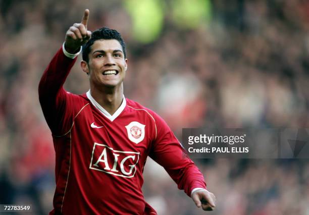 Manchester, UNITED KINGDOM: Manchester United's Cristiano Ronaldo celebrates after scoring against Manchester City during their English Premiership...