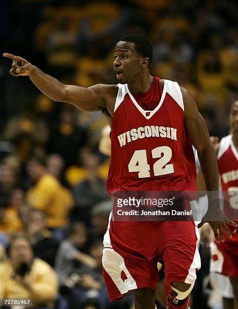 Alando Tucker of the Wisconsin Badgers celebrates in the final minute of Wisconsin's 70-66 win against the Marquette Golden Eagles December 9, 2006...
