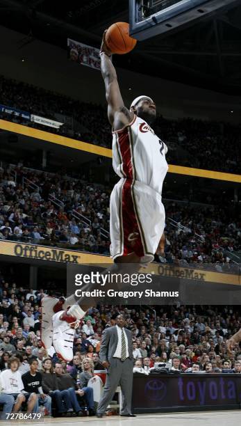 LeBron James of the Cleveland Cavaliers flys in for a dunk against the Indiana Pacers on December 9, 2006 at the Quicken Loans Arena in Cleveland,...