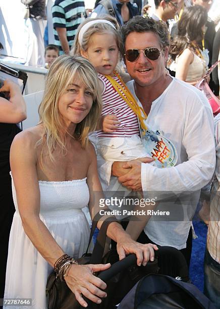 Peter Phelps, wife Donna Fowkes and daughter Polly Elsie Rose arrive at the Australian premiere of Happy Feet at Hoyts Cinema, The Entertainment...