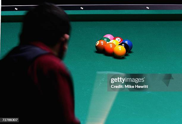 Ooi Fook Yuen of Malaysia prepares to break during during his preliminary Men's 9 Ball Pool Singles match against Yukio Akagariyama of Japan at the...