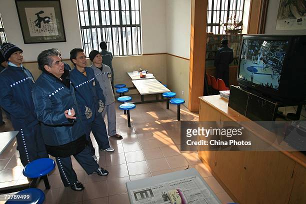 Foreign inmates watch a basketball match after finishing the Hanyu Shuiping Kaoshi test at the Shanghai Qingpu Prison on December 10, 2006 in...